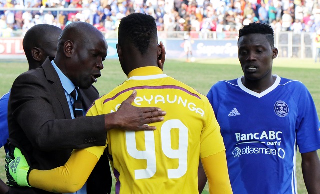 Mutasa gives Tonderai Mateyaunga some instructions when the match was stopped. 
